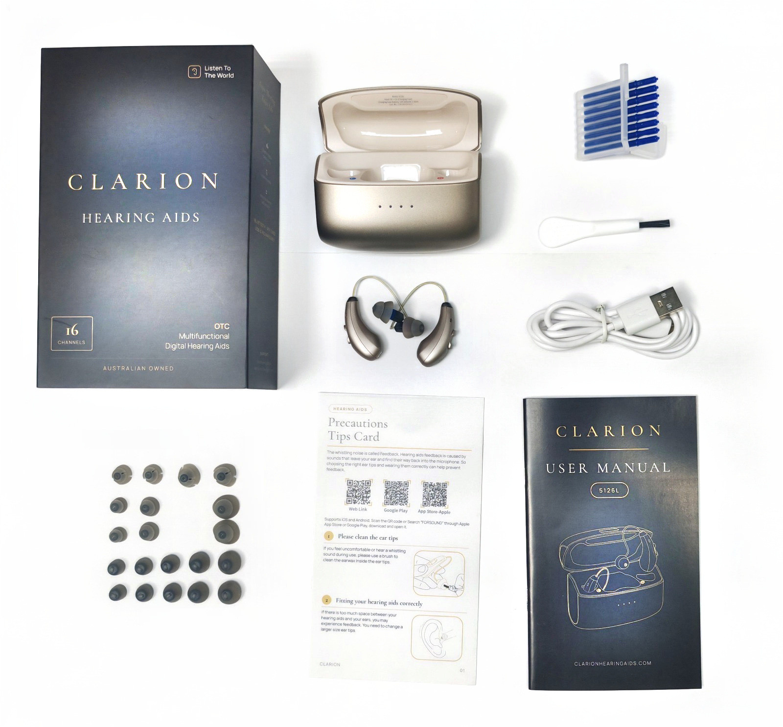 The complete Clarion Clarity S3 kit laid out on white: the retail box, the charging case with both hearing aids, twenty-two ear tips, eight wax guards, a cleaning brush, a USB-C charging cable, the precautions tips card and the user manual.